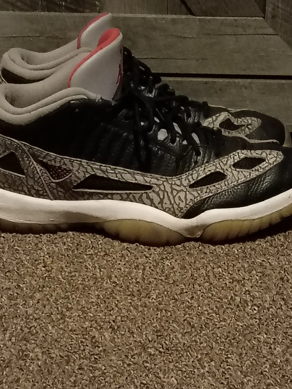 Jordan 11 Retro Low IE sneakers in Black, White and Red